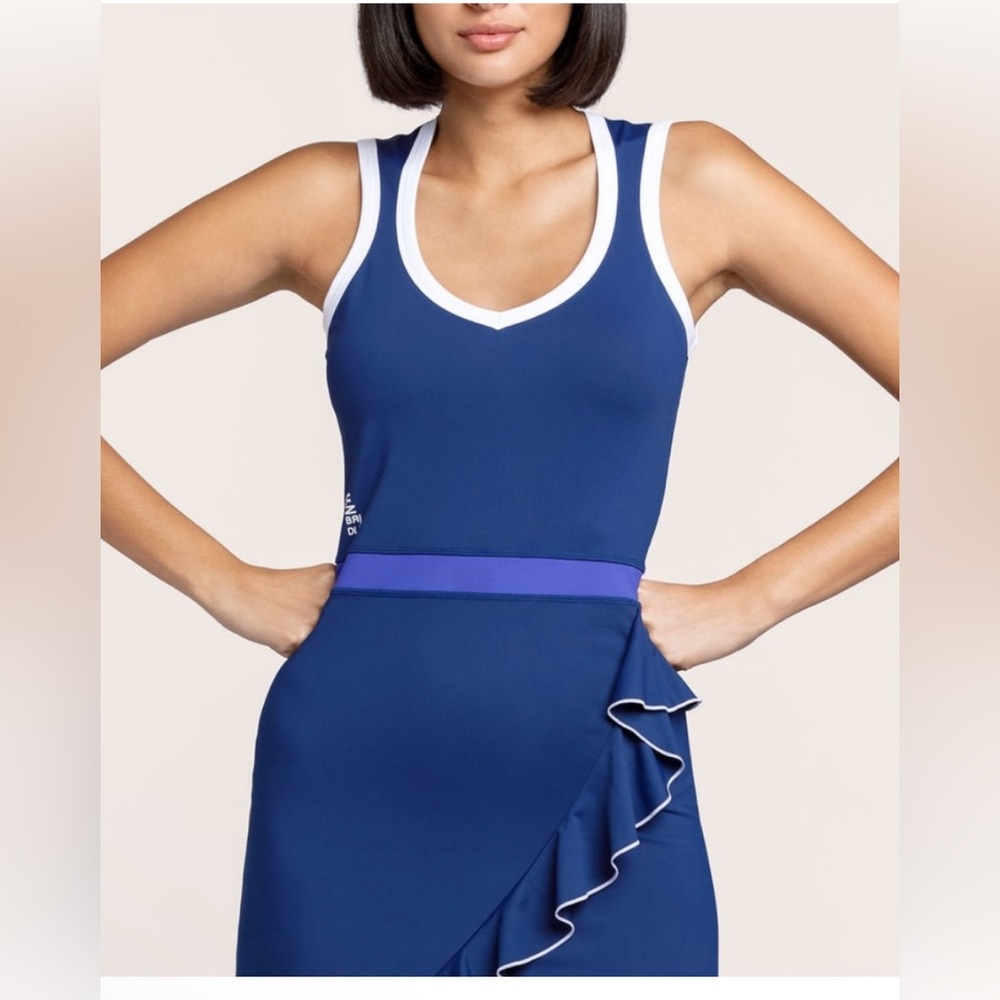 Unbridled women’s small tennis dress. Navy with back pocket. Athletic dress